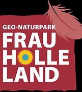 Waage, zwei Hände die aufeinander zugehen. 