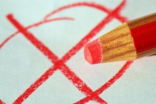 Wahlen Kreuz auf einem Wahlzettel und ein Stift